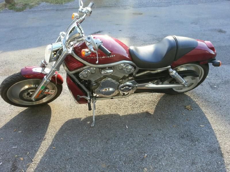 Harley Davidson V-ROD Red in color, good condition, very low miles