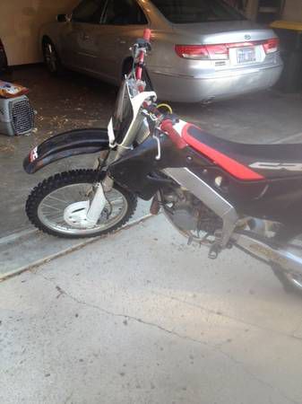 98 Honda CR125 fresh rebuild runs strong need gone make offer!!!!