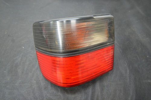 Vw mk3 1993-1999 jetta vento driver side  rear tail light red/smoked oem