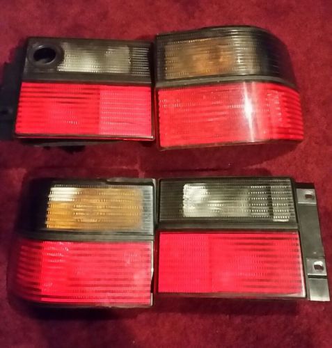 93-99 VW MK3 JETTA VENTO- OEM FACTORY GLX TAILLIGHTS - SMOKE/RED - Hella