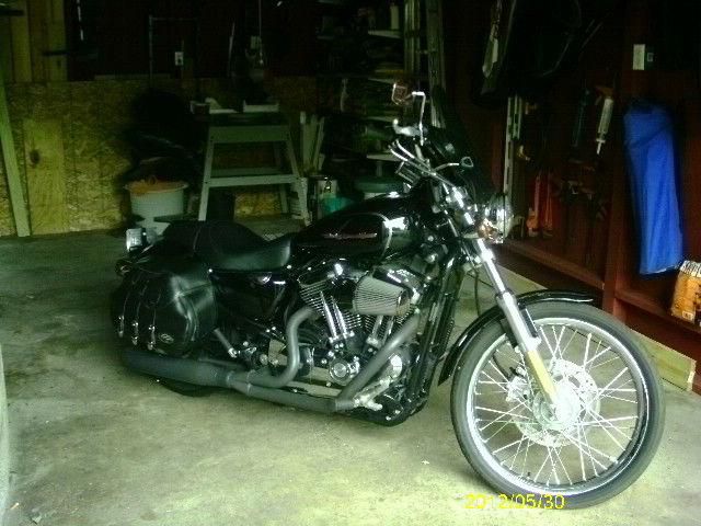 2005 sportster,1200custom,14000miles,good shape custom parts runs great