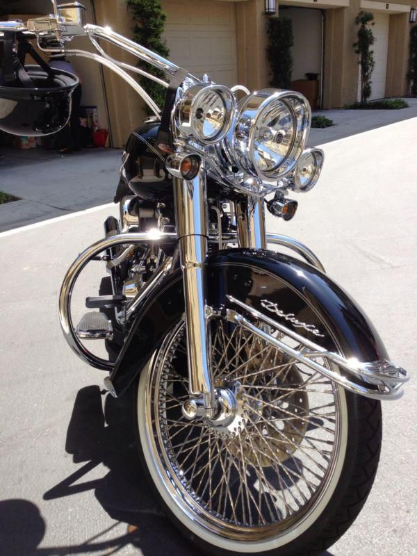 Custom 2012 HD softail deluxe with air bags and custom twisted spoke wheels.....