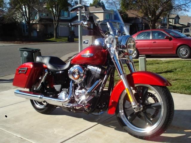 2012 harley davidson fld switchback! red sunglo, low miles, very good condition!