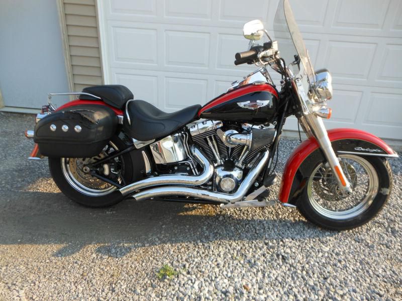 2010 harley davidson softail deluxe flstn only 5300 miles. light damage.
