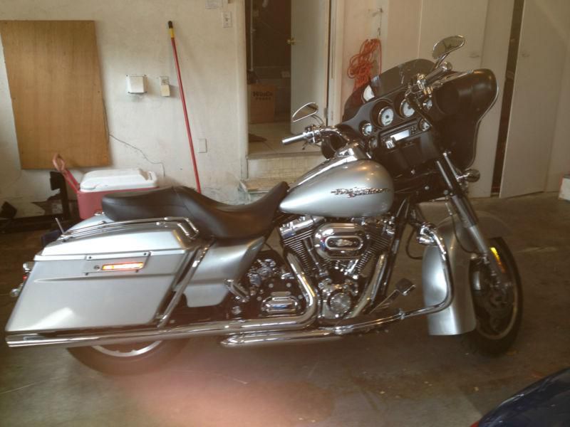 2010 Street Glide, (FLHX), brilliant silver, $17,500