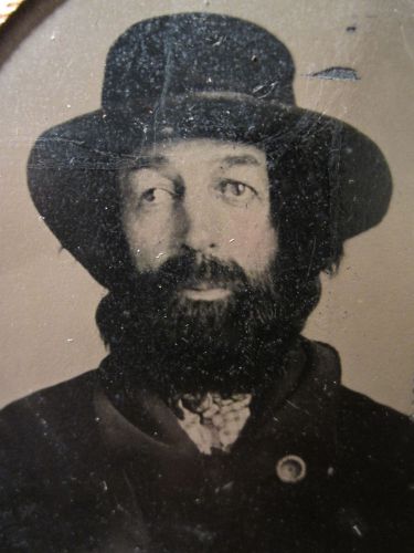 Antique civil war or reconstruction era desperado looking beard tintype photo