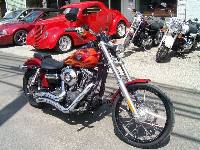 2012 harley davidson wide glide $14,600, ember red w/ flames, 103 inch with s.e.