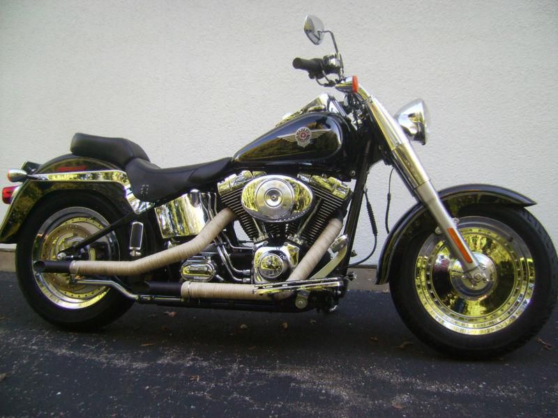 04 fatboy    1500miles  -  why buy new ?