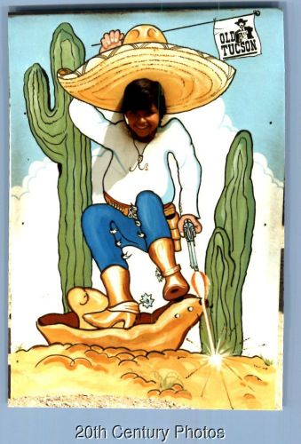 Found color photo e_3032 boy posed smiling in mexican desperado character board