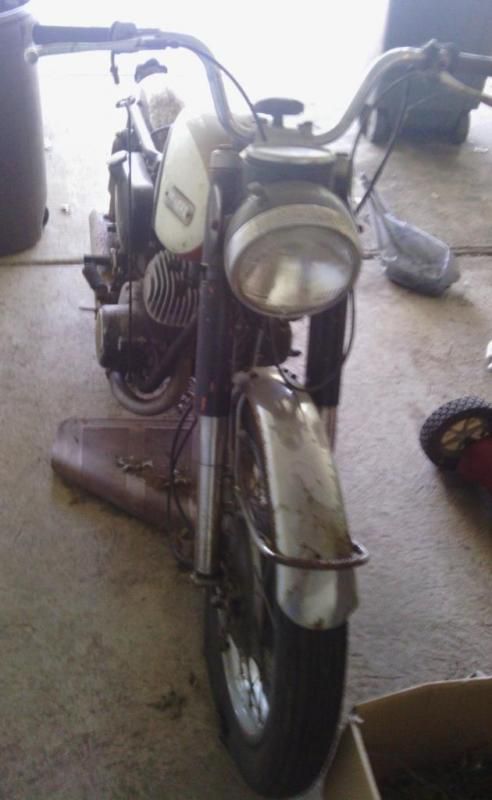 1969 YAMAHA MOTORCYCLE USED AND NOT RUNNING AT THIS TIME COMES WITH EXTRA PARTS