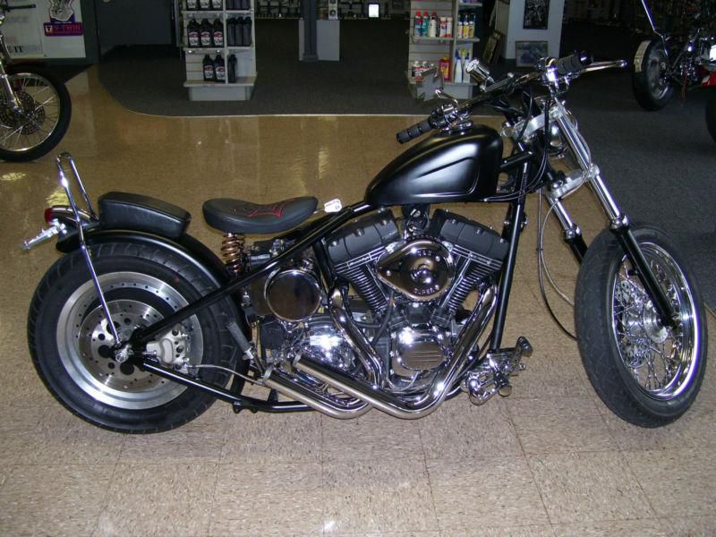 CUSTOM RIGID BOBBER WITH 113 TWIN CAM AND JIMS FAT 5 TRANS.
