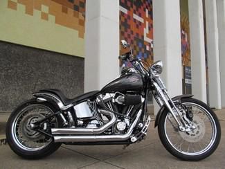 2005 burgundy harley fxstsi springer softail,
custom exhaust,air breather,more