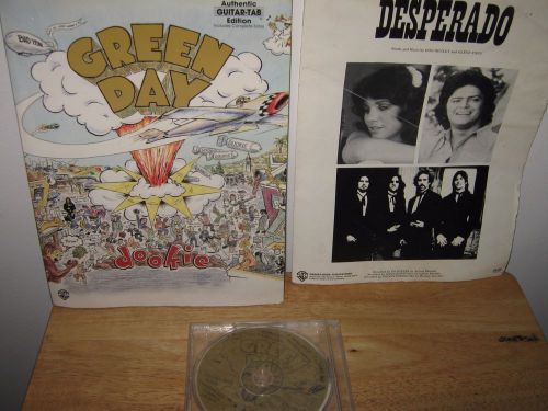 Storage find.lot&gt;3 items.green day dookie guitar-tab song book, &amp; cd. desperado