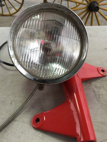 Hodaka motorcycle headlight brackets and speedometer lot