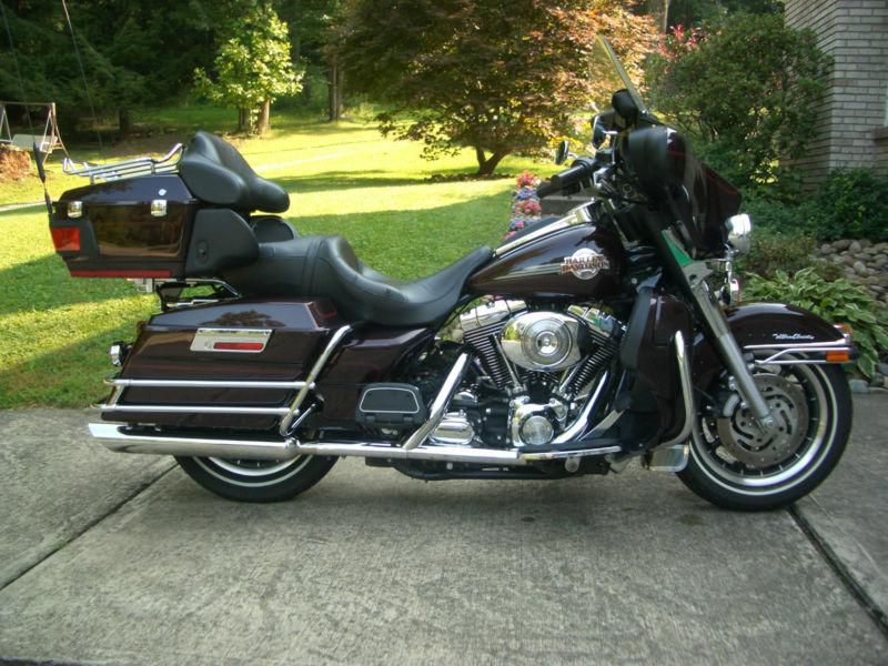 2006 harley davidson ultra classic, color black cherry pearl;  like new